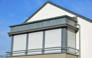 maison avec volets roulants en alu